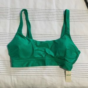 Size medium, scoop neck, never worn. Fits like a true medium.